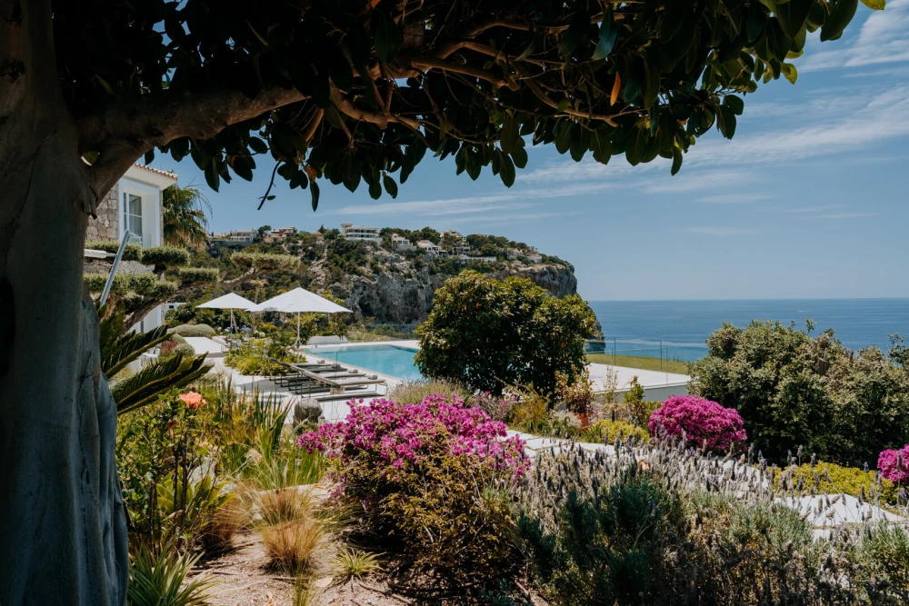 A photo of a Mallorca property showcasing its pool and views.