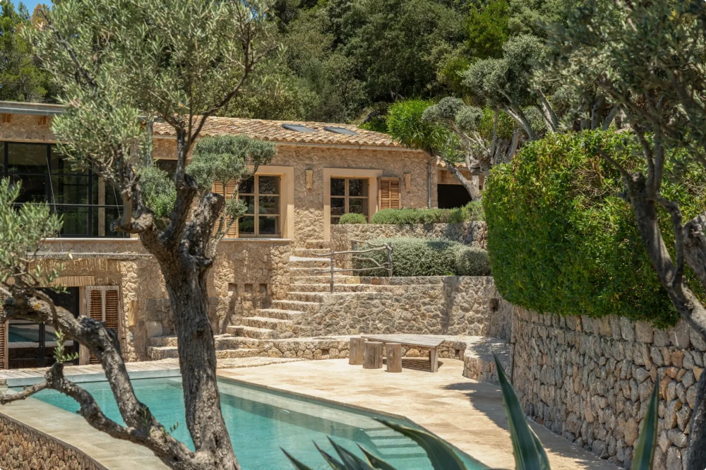 An outdoor pool within the grounds of a Mallorca property