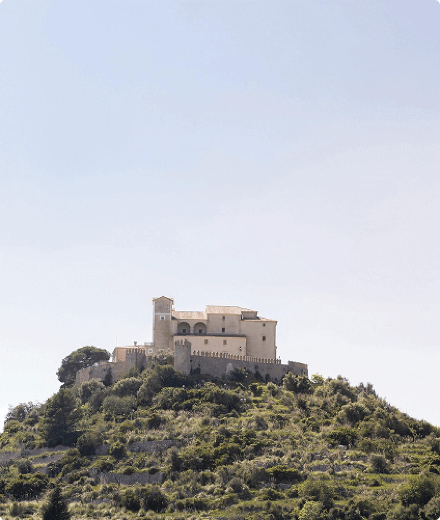 The historic Sant Salvador sanctuary perched on a green hilltop in Artà