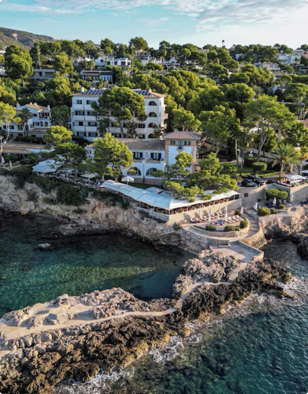 aerial shot of a property on a shore line