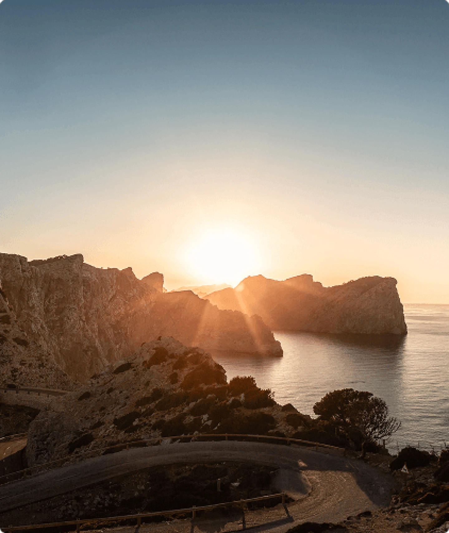 Stunning golden sunset over the rugged coastal cliffs